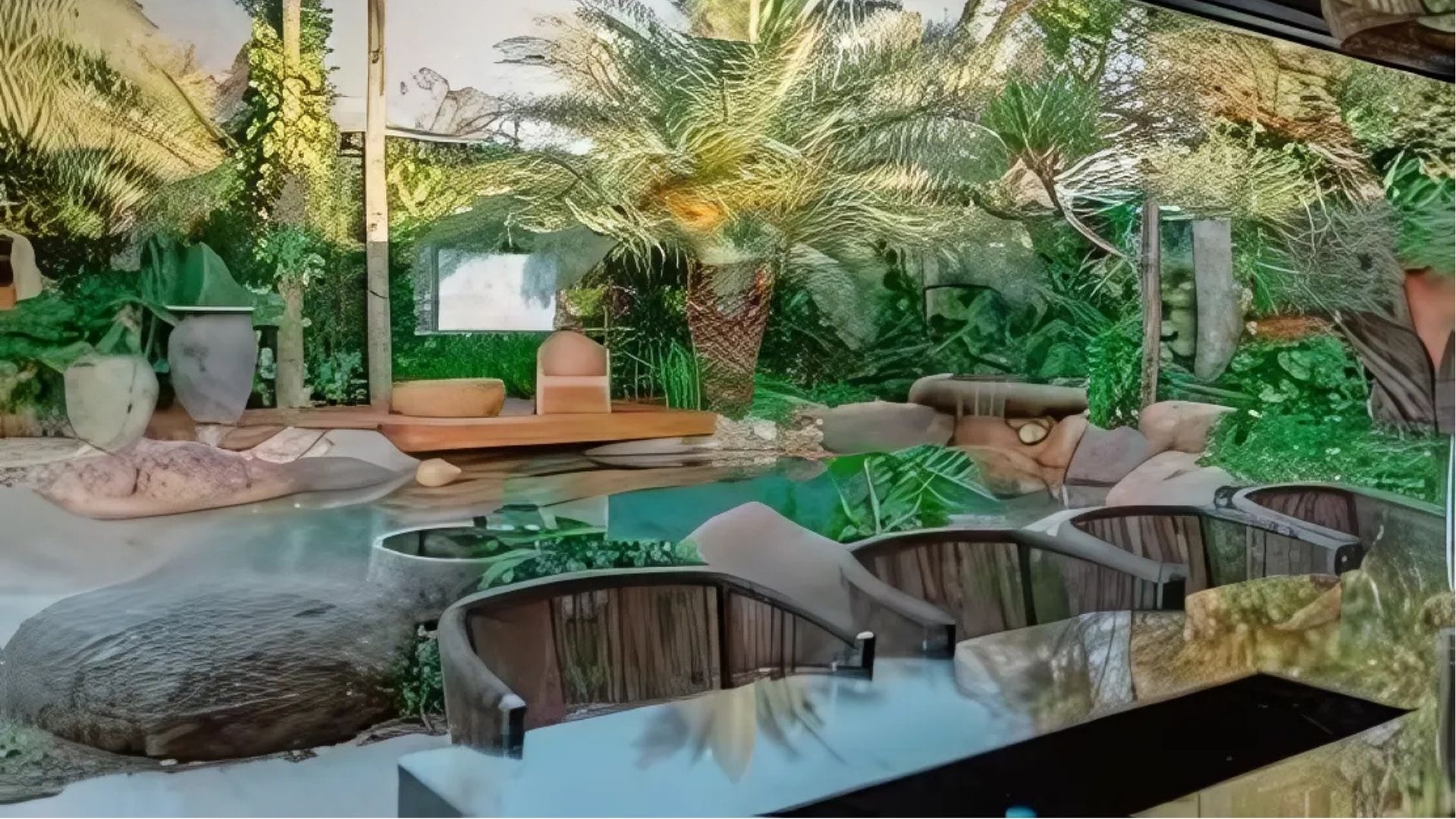 Showroom da Jardim do Éden vira refúgio com lago e pergolado